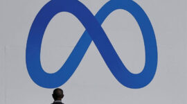 Ilustrasi logo Meta, nama baru induk Facebook, WhatsApp, dan Instagram.(Reuters/ Carlos Barria)