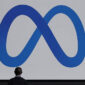 Ilustrasi logo Meta, nama baru induk Facebook, WhatsApp, dan Instagram.(Reuters/ Carlos Barria)