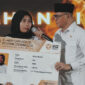 Menteri P2MI Mukhtarudin dalam acara pencanangan Gerakan Nasional Migran Aman di Kantor Kementerian P2MI, Jakarta pada Senin (18/5/2026). (DOK. Humas Kementerian P2MI)
