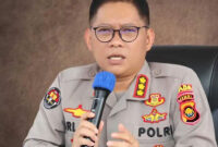 Kabid Humas Polda Jambi, Kombes Pol Erlan Munaji memberikan keterangan. Polda Jambi masih menyelidiki dugaan peretasan Bank Jambi yang menyebabkan kerugian hingga Rp143 miliar. Audit forensik telah selesai dan diharapkan dapat membantu proses penyidikan. 