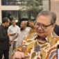 Menteri Koordinator Bidang Perekonomian Airlangga Hartarto usai mengadakan rapat dengan OJK di Kantor Kementerian Koordinator Bidang Perekonomian, Selasa (14/7/2026).(KOMPAS.com/ AGUSTINUS RANGGA RESPATI)