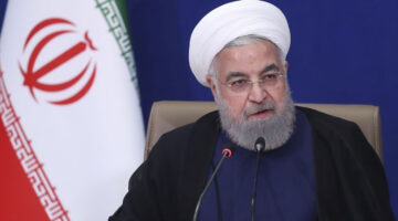 Dalam foto yang dirilis oleh situs resmi kantor Kepresidenan Iran, Presiden Hassan Rouhani berbicara dalam pertemuan di kompleks kepresidenan di Teheran, Iran, Selasa, 6 Juli 2021. (OFFICE OF THE IRANIAN PRESIDENSY via AP)